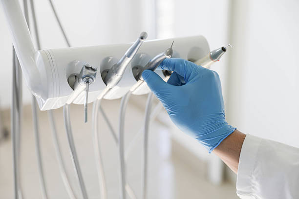 Professional Tooth Extraction technician working in Montclair, VA
